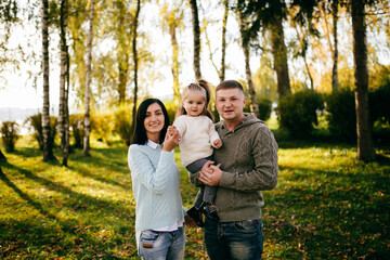 Wall Mural - Family in green nature together