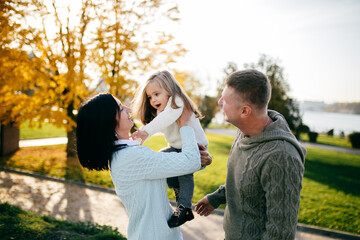 Wall Mural - Family in green nature together