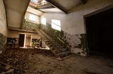 Stairs In An Abandoned House, A Destroyed Industrial Building, A House With Broken Windows.