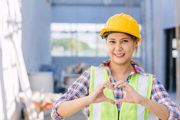 Architect engineer foreman builder foreman construction worker happy smile hand love heart sign