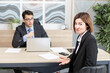 © Vitaliy - Confused woman in suit feeling stress on interview in the office