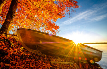 Canvas Print - old row boat at a lake