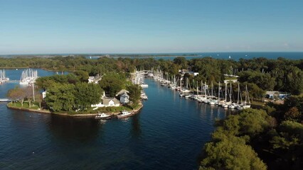 Wall Mural - Aerial view of Toronto Island marina and Lake Ontario by day during summer in Toronto, Ontario, Canada. 