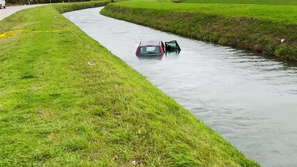 Wall Mural - Car accident with vehicle in the river