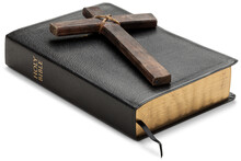 Religion Concept. Black Bible With Wooden Cross