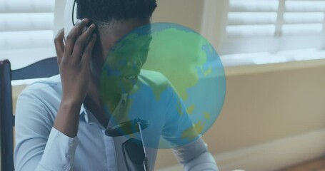 Sticker - Animation of globe over african american woman