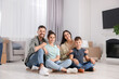 © New Africa - Happy family spending time in new apartment. Moving day