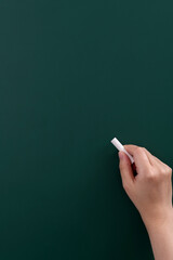 Sticker - Hand holding chalk writing on chalkboard