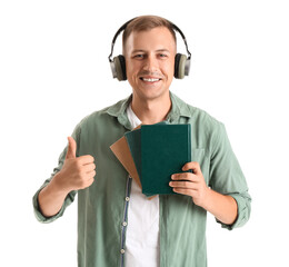 Poster - Young man with headphones and books showing thumb-up on white background. Online education