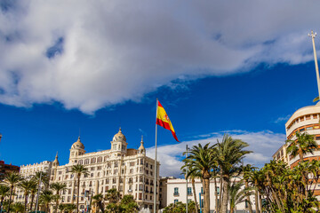 urban landscape from alicante to city center with spanish flag