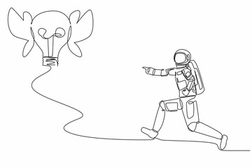 Poster - Single one line drawing young astronaut chasing flying light bulb in moon surface. Searching new invention in space exploration. Cosmonaut deep space. Continuous line draw design vector illustration