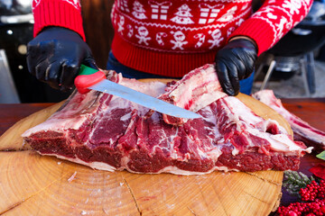 debone piece of meat. preparing meat for the grill