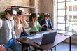 © MandriaPix - Creative multiracial teamwork using hightech headset for virtual reality, modern and futuristic device for planning and develop business and strategy, focus on blonde woman, copy space