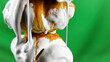 Sweets in white cream. Stock clip. Dripping white liquid on baking. Baking with liquid dripping cream. Close-up of cream bun on green background