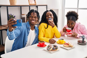 Sticker - African american friends having breakfast and make selfie by the smartphone at home