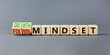 © Dzmitry - Growth or fixed mindset symbol. Concept words Growth mindset and Fixed mindset on wooden cubes. Beautiful grey table grey background. Business growth or fixed mindset concept. Copy space.