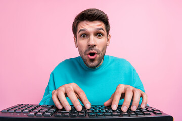 Aufkleber - Photo portrait of attractive young man writing typing computer gamer dressed stylish blue clothes isolated on pink color background