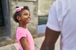 © Krakenimages.com - Father and daughter smiling confident walking with hands together at street
