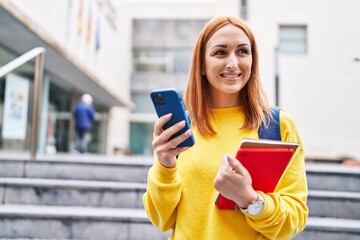 Poster - Young caucasian woman student smiling confident using smartphone at university