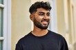 © Krakenimages.com - Young arab man smiling confident at street