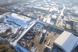 Fototapeta Miasto - aerial view of a large industrial estate in Manchester, UK Recycling Plant. Snow winter weather