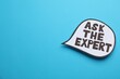 © New Africa - Speech bubble sticker with phrase Ask The Expert on light blue background. Space for text