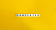 © photoopus - Completed Word on Letter Tiles on Yellow Background. Minimal Aesthetics.