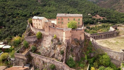 Sticker - Corsica travel and landmarks. aerial drone video of medieval Corte town- mountain village in the central part of island
