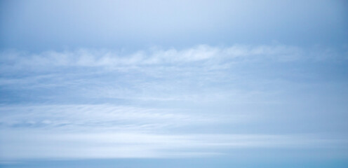 Wall Mural - cloudy light blue sky on a daytime, natural panoramic photo