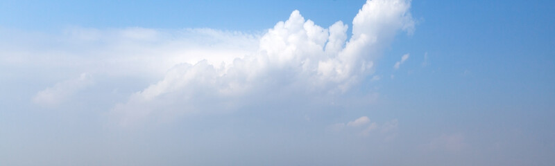 Wall Mural - light blue sky with white clouds on a daytime. natural panorama