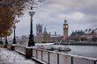 The snow covered Westminster Palace and Big Ben tower in London, England, during a cold winter morning