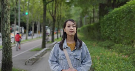 Poster - Woman walk in the street