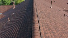 Aerial Over Residential Roof With Red Shingles