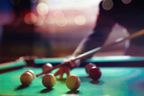 Fototapeta  - Billiard balls and cue on pool table. Russian billiards. Close-up of items for the game. Background space. Concept of sports games. Place for an inscription or logo. Copy space for site or banner