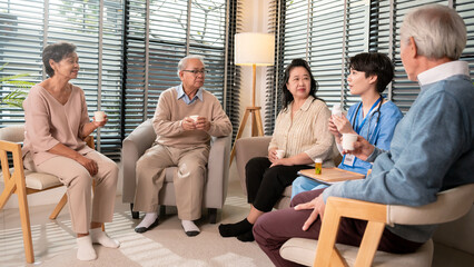 Wall Mural - Group of Asian senior people are given advice by professional self care psychologist  at elderly healthcare center, elder group therapy Geriatric consultation concept