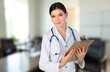© BillionPhotos.com - Young doctor hold digital tablet in clinic