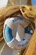 Life buoy on the boat. Welcome onboard sign 