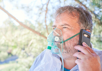 overweight senior man who needs oxygen supply calls an emergency telemedical care service. aftermath