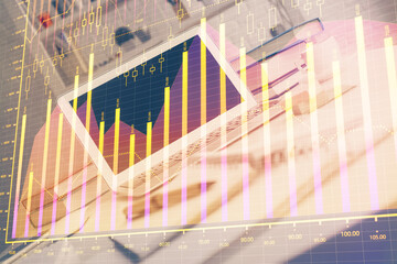 Poster - Stock market graph on background with desk and personal computer. Double exposure. Concept of financial analysis.