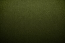 Brown Green Cloth Surface. Gradient. Olive Colors. Dark Shade. Abstract Fabric Background With Space For Design. Canvas. Rough, Grainy, Durable. Matte, Shimmer. Template, Empty.