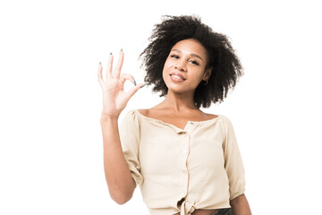 Wall Mural - Portrait of a smiling woman with curly hair on a transparent background shows a gesture with her hands