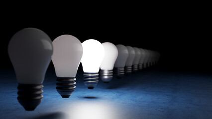 Wall Mural - The concept of a light bulbs in a row, a glowing light bulb, light bulb background, leader, light, idea