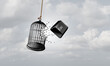 Escape metaphor and Concept of freedom as a business idea to break free with an Esc computer key button breaking out of a bird cage