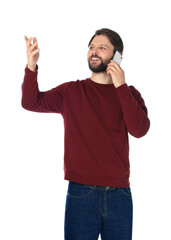 Wall Mural - Man talking on smartphone against white background