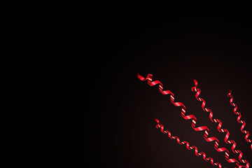 Wall Mural - red serpentine on black background with copy space