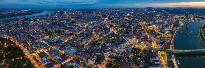 Wall Mural - Aerial view around the city capitol Belgrade in Serbia on an early night on an autumn day.