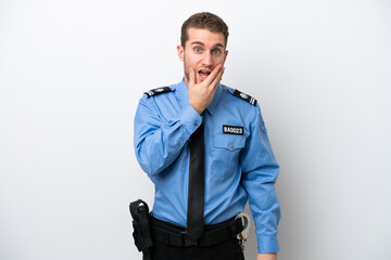 Wall Mural - Young police caucasian man isolated on white background surprised and shocked while looking right