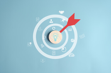 Fototapete - Light bulb icon which for mind, creative, idea, innovation, motivation on aiming target dashboard on wooden circle for planning development leadership and customer target group concept.