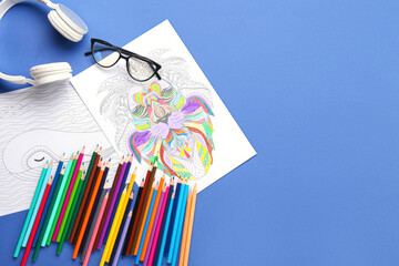 Poster - Coloring pages, pencils, eyeglasses and headphones on blue background