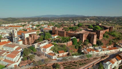 Wall Mural - Aerial view of Silves town with famous castle and Cathedral, Algarve, Portugal